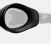 Close-up view of the goggle lens focused on the proprietary eye seals designed for comfort and water resistance.